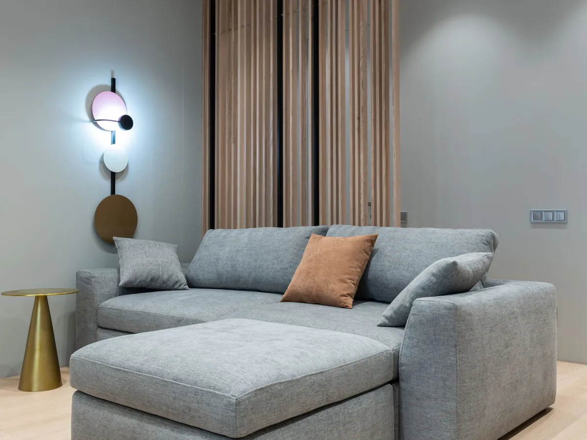 Modern living room with a wall-mounted air conditioning unit